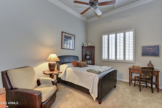 carpeted bedroom with ceiling fan and ornamental molding