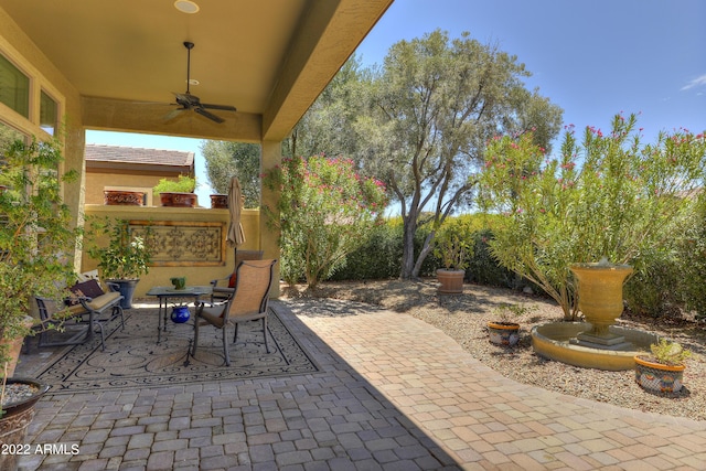 view of patio / terrace with ceiling fan