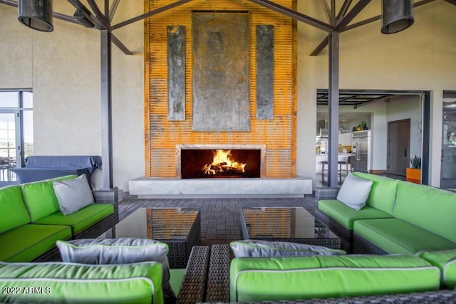 exterior space with a large fireplace