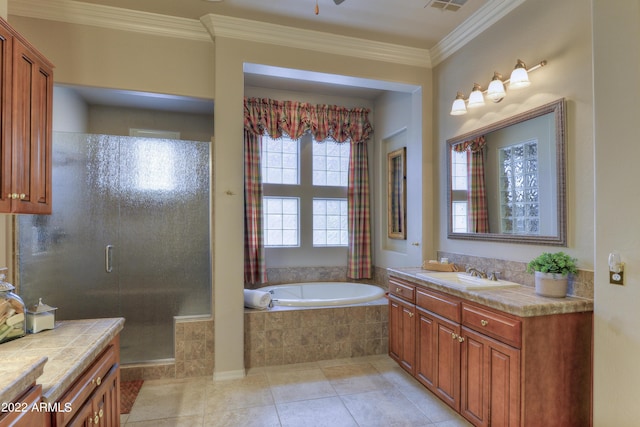 bathroom featuring tile patterned floors, vanity, ornamental molding, and shower with separate bathtub