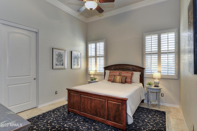 tiled bedroom featuring ceiling fan, ornamental molding, and multiple windows