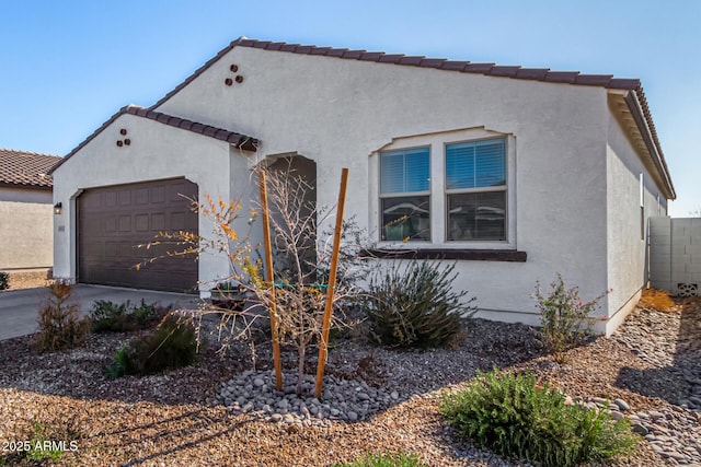 view of front of home with a garage