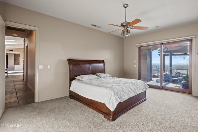 bedroom with ceiling fan, carpet floors, and access to outside