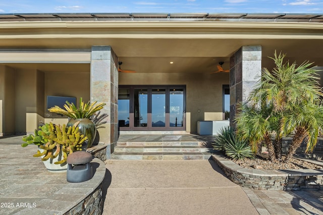 entrance to property featuring french doors