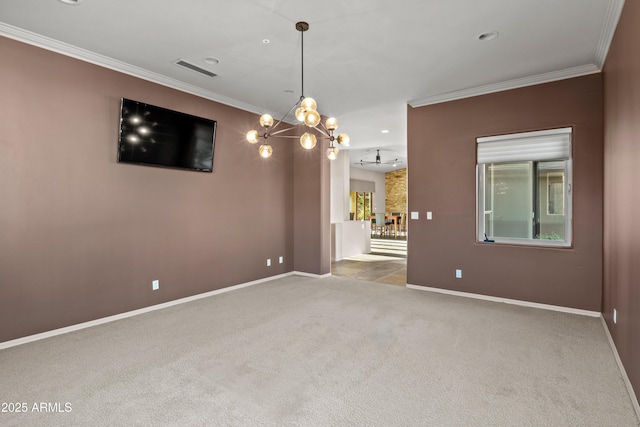 spare room with light carpet, crown molding, and ceiling fan with notable chandelier