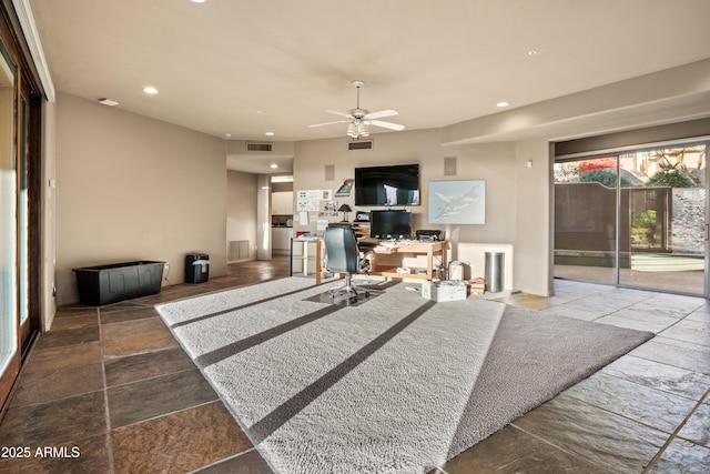 living room with ceiling fan