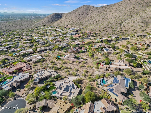 drone / aerial view featuring a mountain view