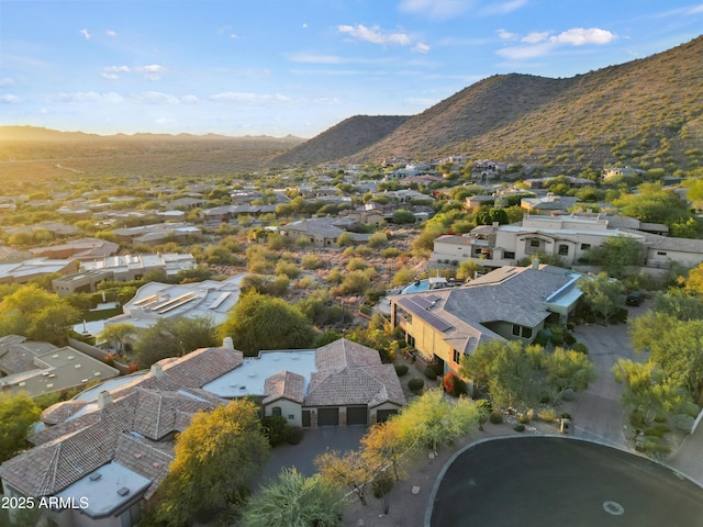 drone / aerial view featuring a mountain view