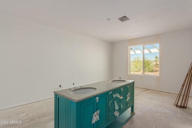 bathroom featuring concrete floors