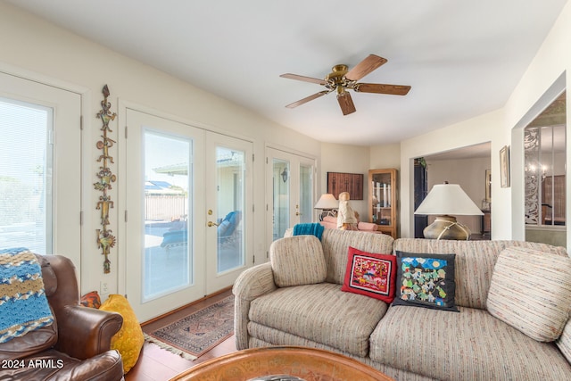 living room with french doors and ceiling fan