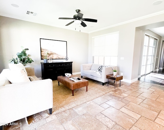 living room with ceiling fan and ornamental molding