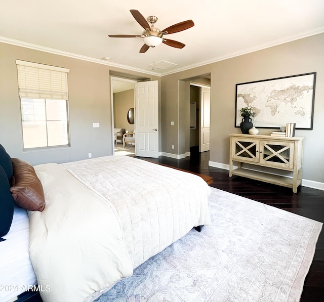 bedroom with ornamental molding, dark hardwood / wood-style floors, and ceiling fan