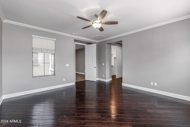 spare room featuring crown molding, ceiling fan, and dark hardwood / wood-style flooring