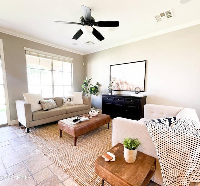 living room with ceiling fan and ornamental molding