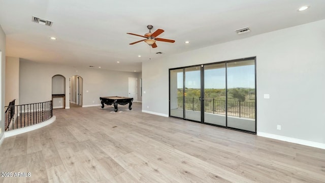 unfurnished room with ceiling fan, pool table, and light hardwood / wood-style floors