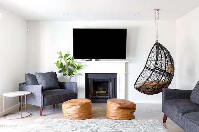3907 E Marilyn Rd, Phoenix, AZ 85032 - tiled living area featuring a fireplace and baseboards