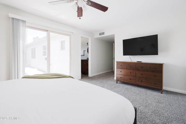 3907 E Marilyn Rd, Phoenix, AZ 85032 - carpeted bedroom featuring baseboards, a ceiling fan, and ensuite bathroom