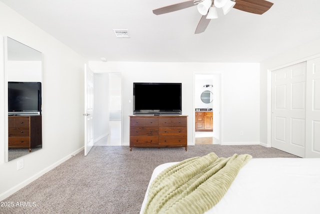 3907 E Marilyn Rd, Phoenix, AZ 85032 - bedroom with carpet floors, baseboards, a closet, a ceiling fan, and connected bathroom