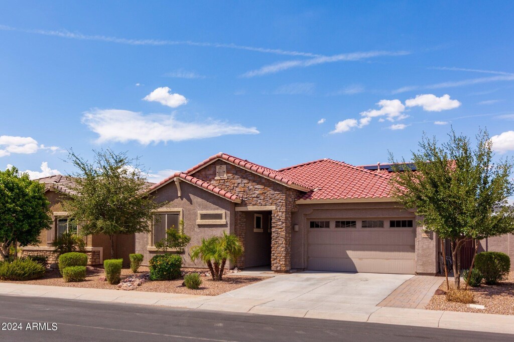 view of front of property with a garage