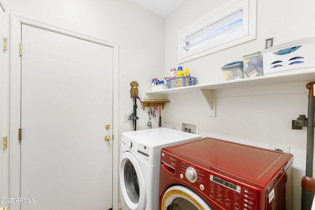 laundry room featuring separate washer and dryer