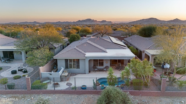 aerial view at dusk with a mountain view