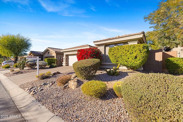 ranch-style home with a garage