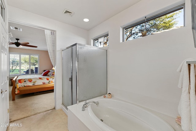 bathroom with ceiling fan, tile patterned flooring, and independent shower and bath