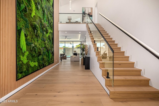 8038 E Clarendon Ave, Scottsdale, AZ 85251 - stairs with wood finished floors and a high ceiling