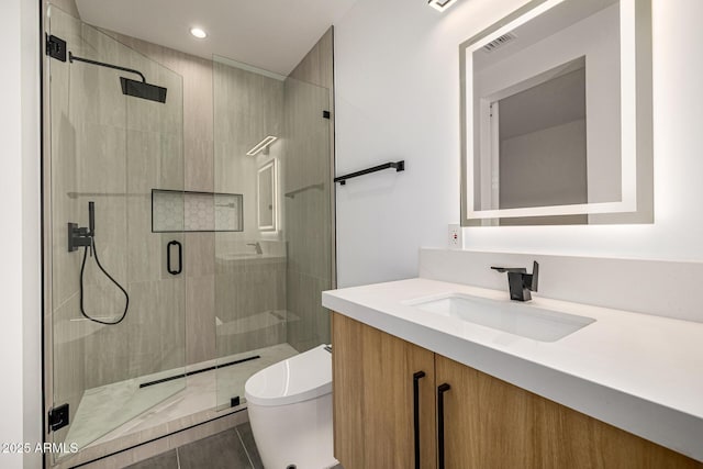 8038 E Clarendon Ave, Scottsdale, AZ 85251 - bathroom featuring vanity, a stall shower, and recessed lighting