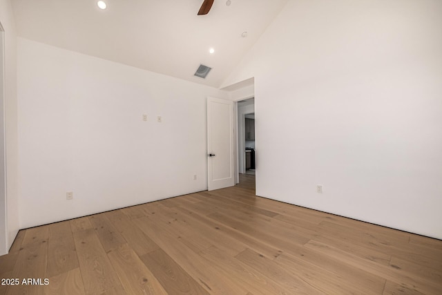 8038 E Clarendon Ave, Scottsdale, AZ 85251 - empty room with light wood finished floors, high vaulted ceiling, ceiling fan, and recessed lighting
