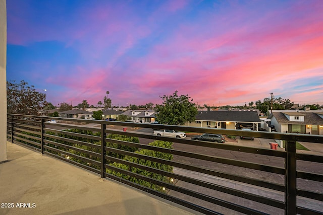 8038 E Clarendon Ave, Scottsdale, AZ 85251 - balcony at dusk with a residential view