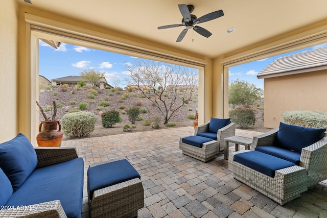 view of patio featuring ceiling fan and outdoor lounge area