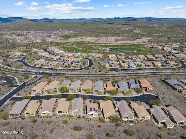 drone / aerial view featuring a mountain view