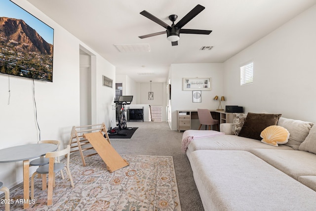 12209 W Washington St, Avondale, AZ 85323 - carpeted living area featuring an office area and a ceiling fan