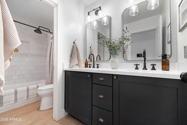 2982 S Holguin Way, Chandler, AZ 85286 - full bathroom with toilet, double vanity, shower / tub combo with curtain, and wood finished floors