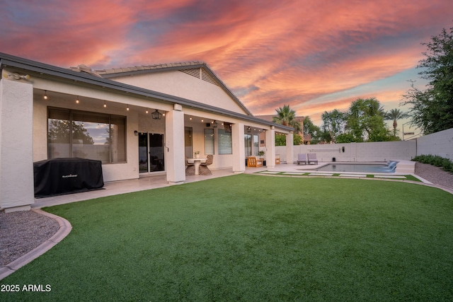 2982 S Holguin Way, Chandler, AZ 85286 - yard at dusk featuring a patio