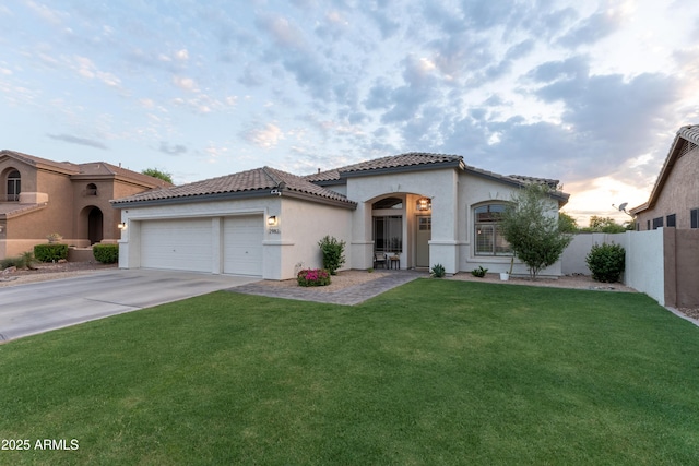 2982 S Holguin Way, Chandler, AZ 85286 - mediterranean / spanish-style home with stucco siding, a tiled roof, driveway, and an attached garage