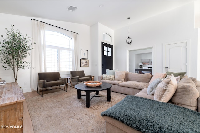 2982 S Holguin Way, Chandler, AZ 85286 - living area featuring light wood-style floors and a towering ceiling