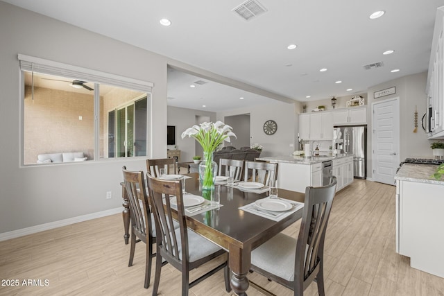 2343 E Kelly Dr, Gilbert, AZ 85298 - dining room featuring light wood-style floors, recessed lighting, and baseboards
