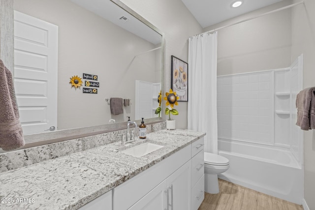 2343 E Kelly Dr, Gilbert, AZ 85298 - bathroom featuring wood finished floors, vanity, toilet, and shower / bath combo