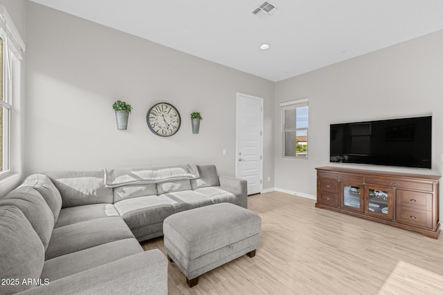 2343 E Kelly Dr, Gilbert, AZ 85298 - living area featuring light wood finished floors, baseboards, and recessed lighting