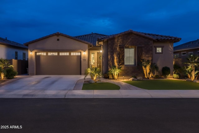 2343 E Kelly Dr, Gilbert, AZ 85298 - single story home featuring a tile roof, driveway, a garage, and stucco siding