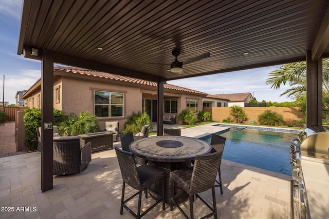 2343 E Kelly Dr, Gilbert, AZ 85298 - fenced backyard with a patio, ceiling fan, grilling area, and outdoor dining space