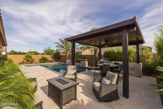 2343 E Kelly Dr, Gilbert, AZ 85298 - fenced backyard with ceiling fan, a patio area, an outdoor living space, and outdoor dining space