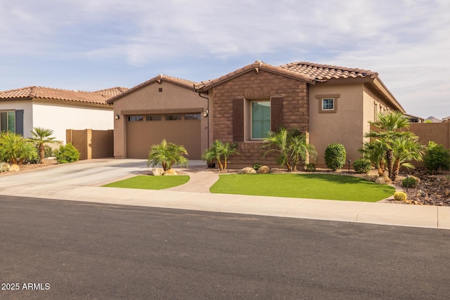 2343 E Kelly Dr, Gilbert, AZ 85298 - view of front facade with a tiled roof, an attached garage, concrete driveway, and stucco siding