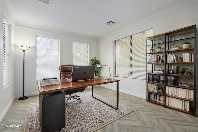 office featuring baseboards, visible vents, and crown molding