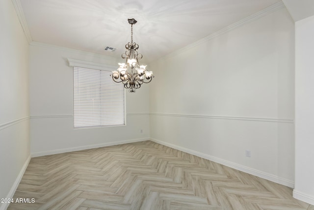 spare room featuring a chandelier, baseboards, visible vents, and crown molding