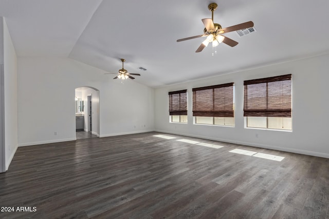 unfurnished living room featuring ceiling fan, dark hardwood / wood-style flooring, and lofted ceiling