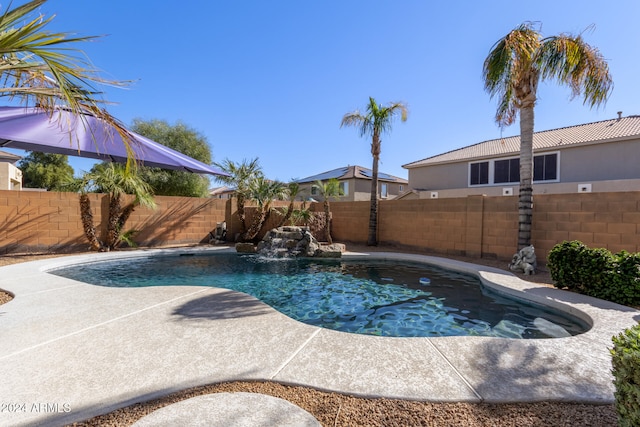 view of pool featuring pool water feature