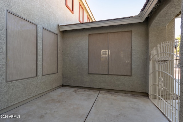 entrance to property with a patio area